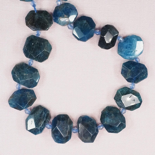 Flat apatite faceted chunks