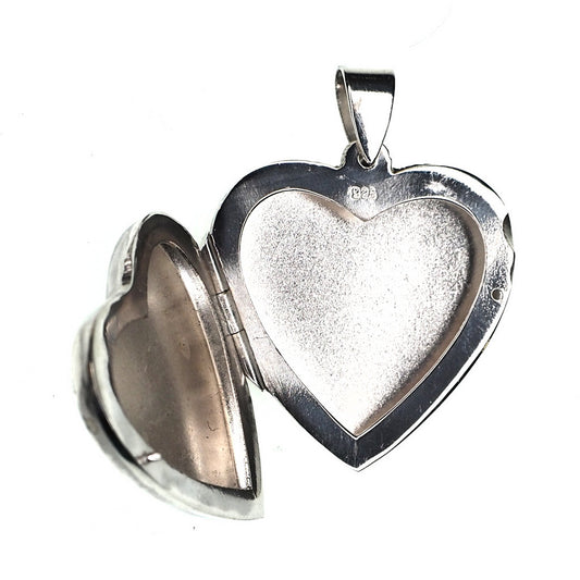 Sterling silver heart locket with incising
