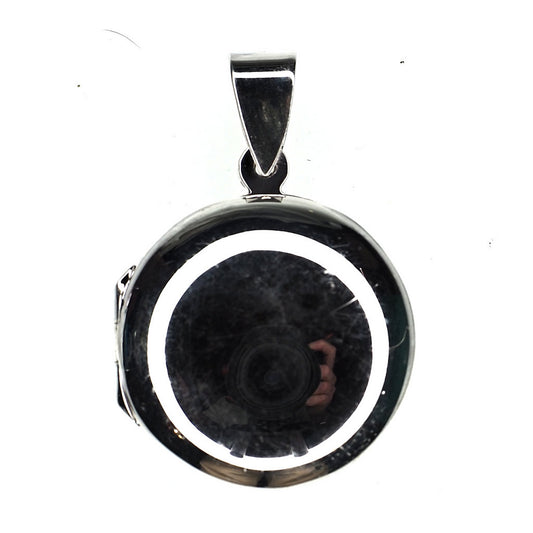 Small round sterling silver locket