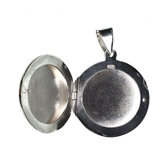Smooth round sterling silver locket