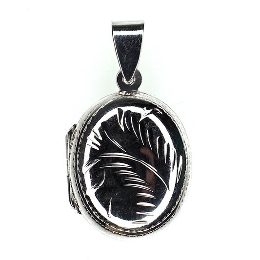 Petite oval incised sterling silver locket