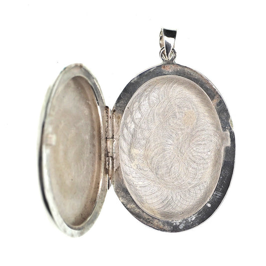 Large oval sterling silver locket