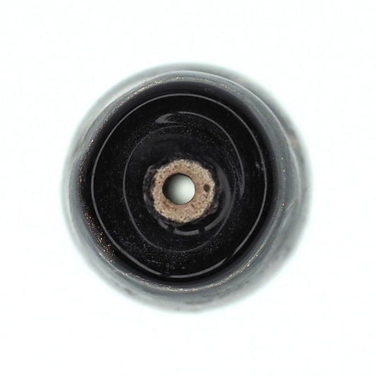 Black round tube bead with gold stripe