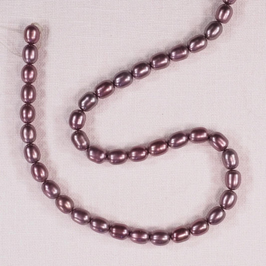 8 mm dark mauve oval pearls