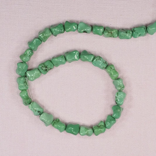 8 mm to 10 mm by 6 mm irregular dog bone green beads