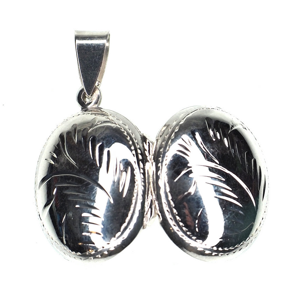 Petite oval incised sterling silver locket