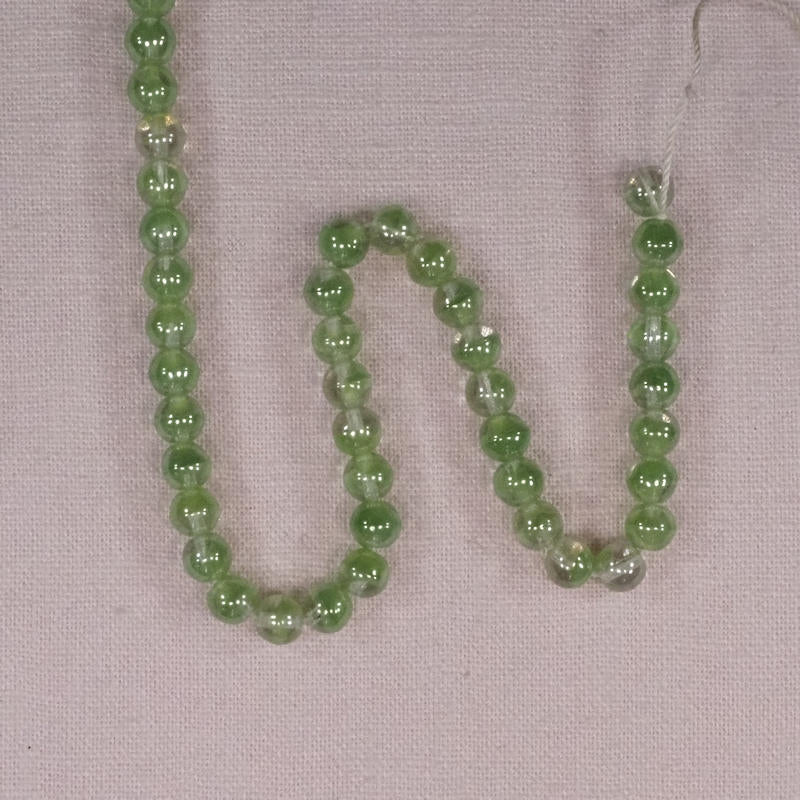6 mm round green-clear beads