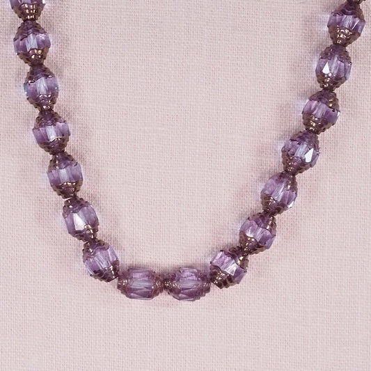 Purple and gold faceted Czech bicone beads