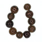Amber bead with gold stripe