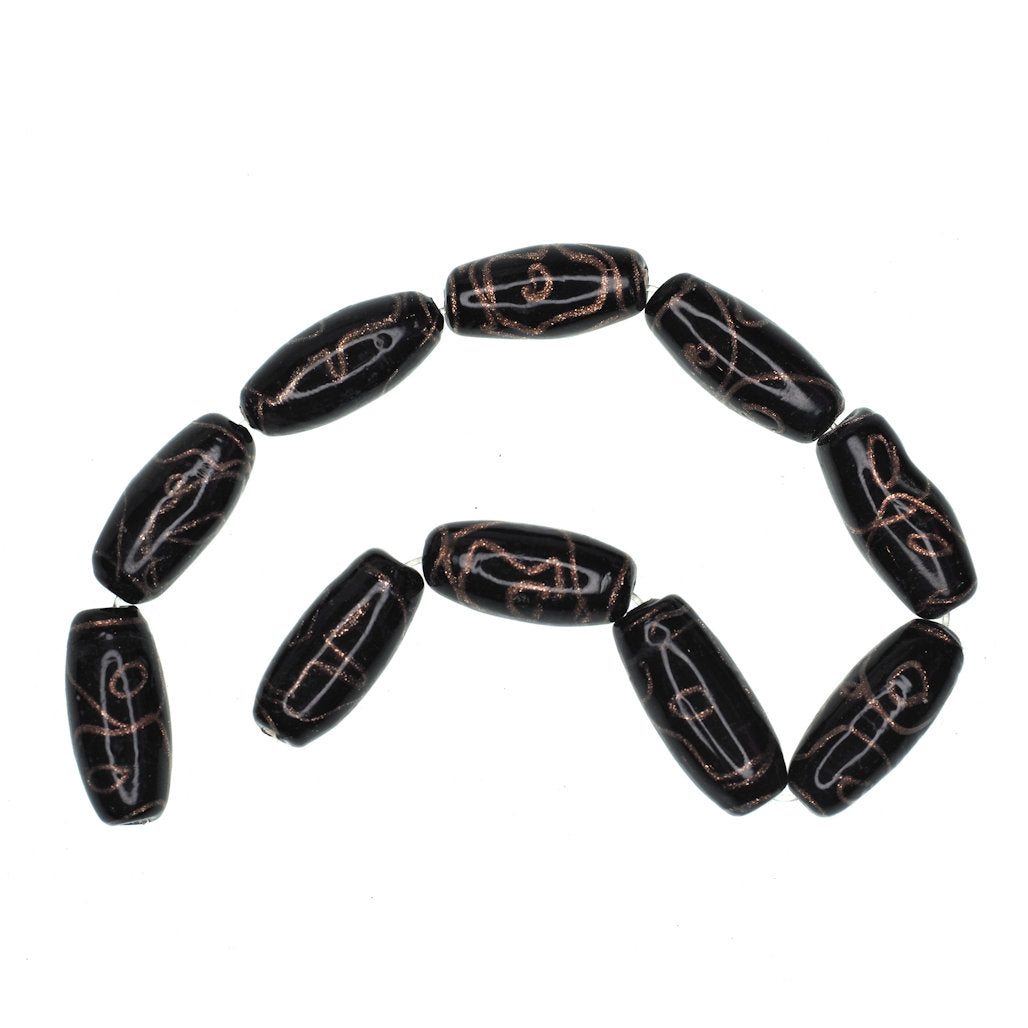 Black round tube bead with gold stripe