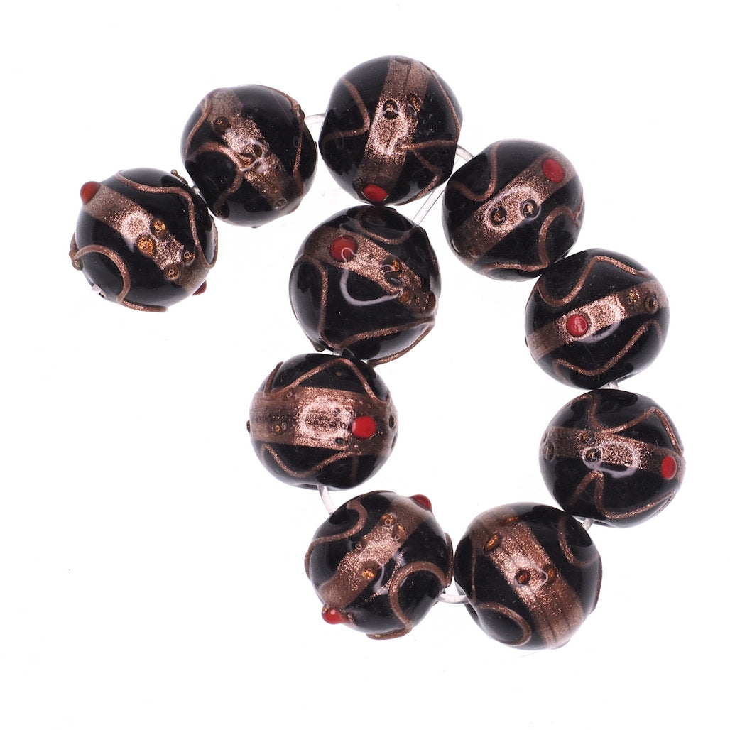 Black bead with gold stripe