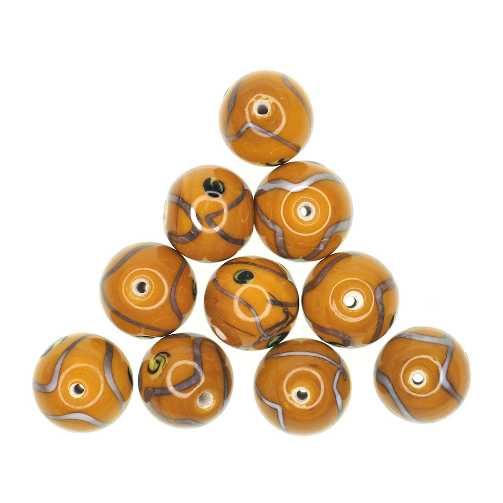 Mustard gold bead with black round dots