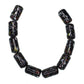 Black background millefiori tube beads