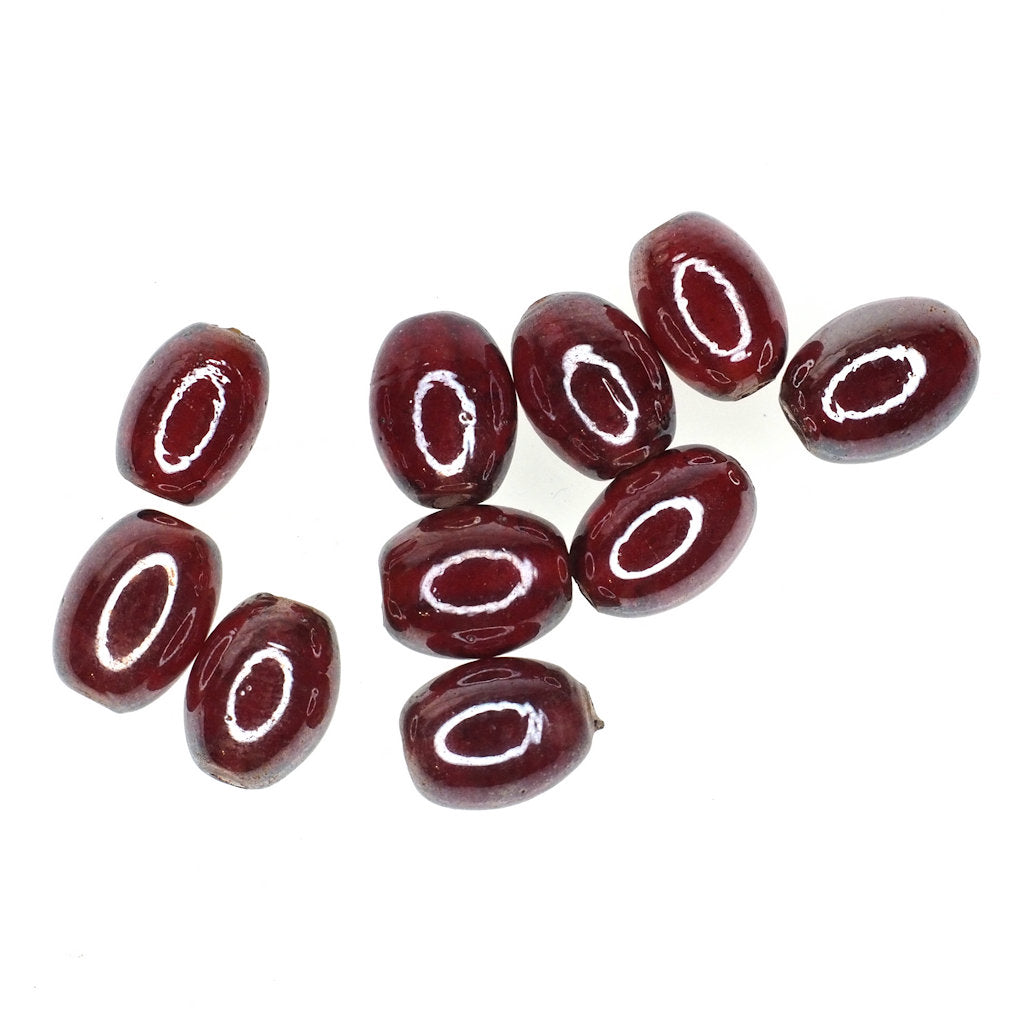 Luminous red round oval bead