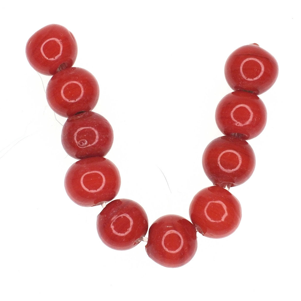 Opaque red round glass bead