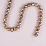 10 mm light gold-pink rondelle pearls