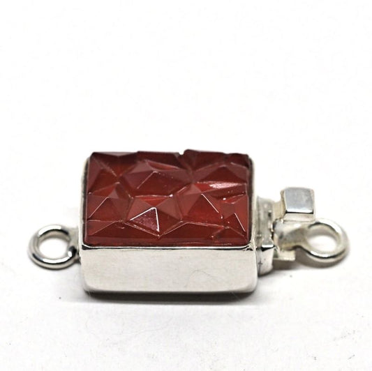 Small broken-ice carnelian clasp