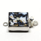 Random black and white clasp