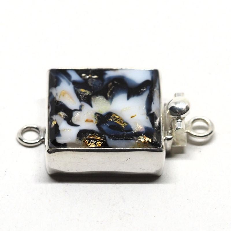 Random black and white clasp