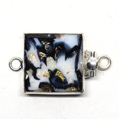 Random black and white clasp