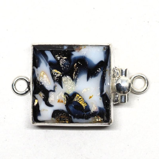 Random black and white clasp