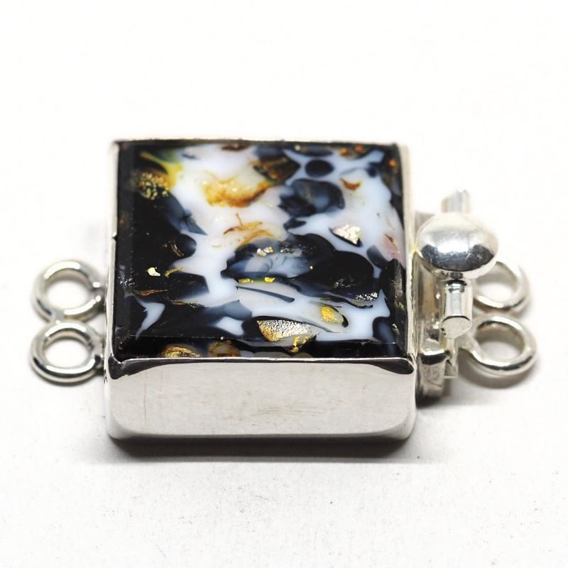 Random black and white clasp
