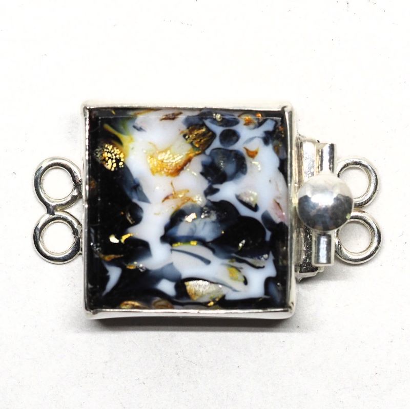 Random black and white clasp
