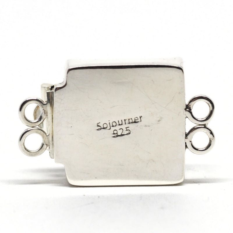 Random black and white clasp
