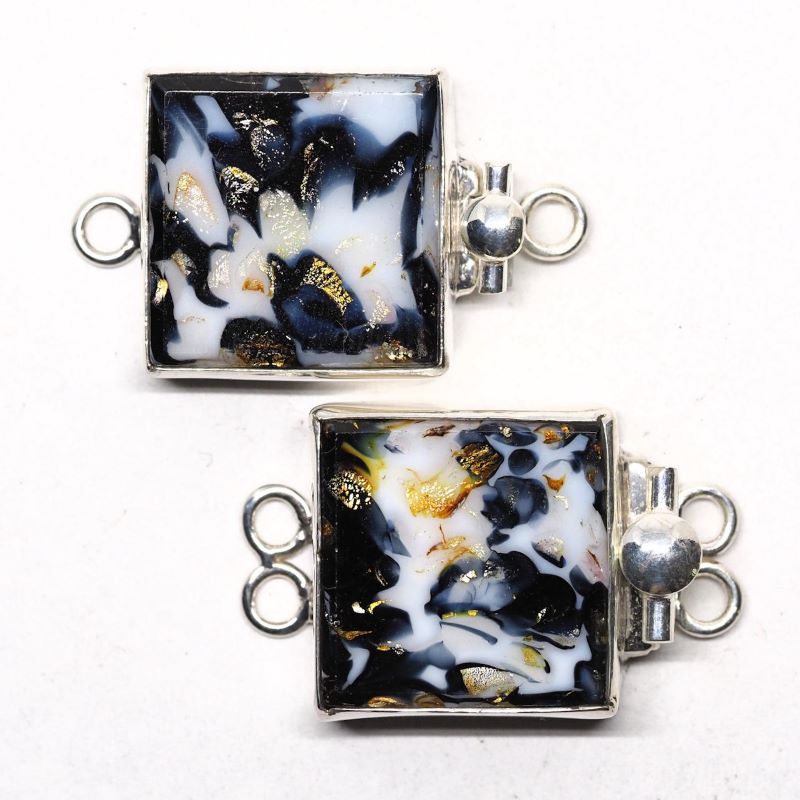 Random black and white clasp