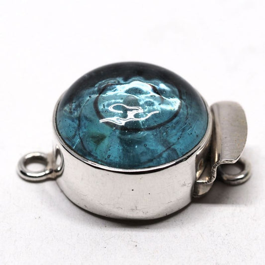 Aqua wave clasp