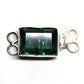 Emerald double-X clasp