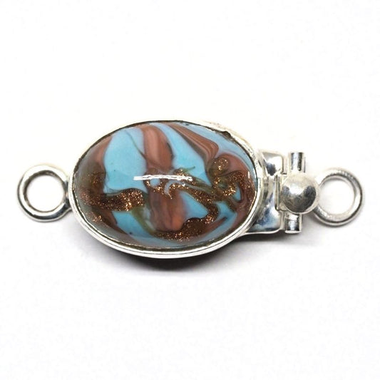 Oval blue swirl clasp