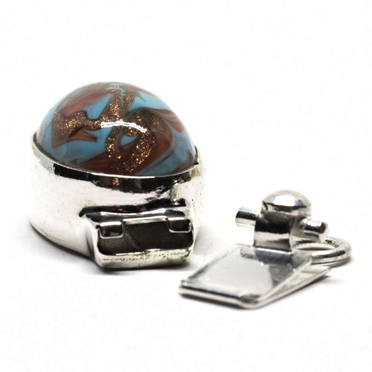 Oval blue swirl clasp