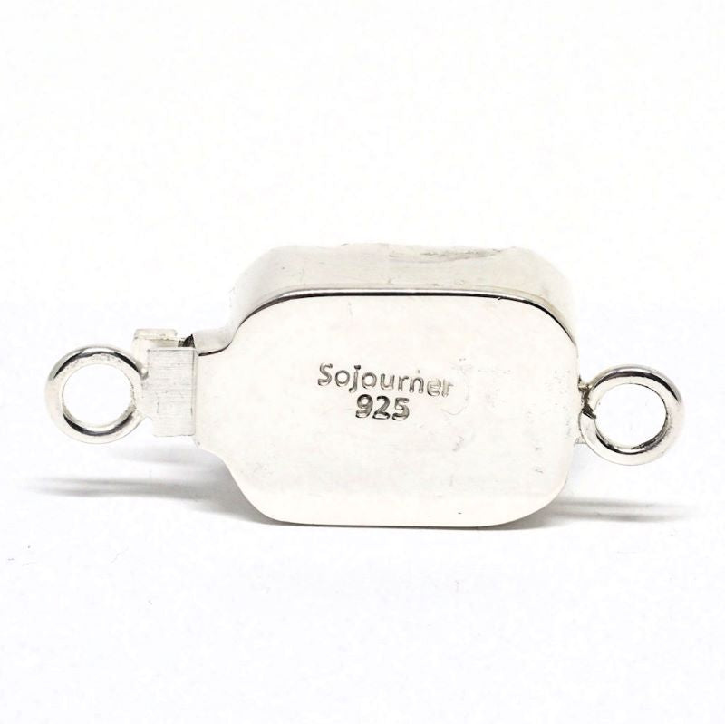 Dark blue pressed flower clasp
