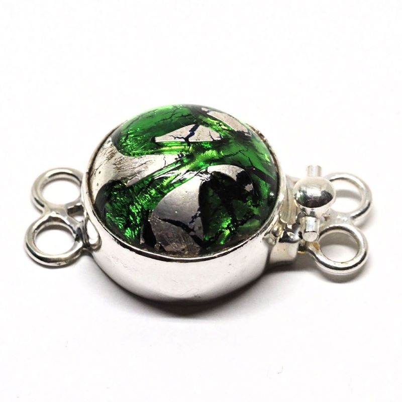 Emerald and silver clasp