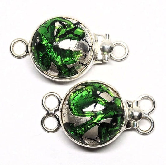 Emerald and silver clasp