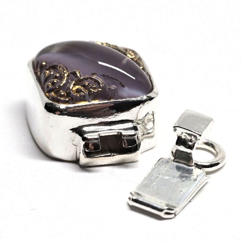 Tiny purple clasp