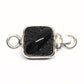 Tiny black clasp