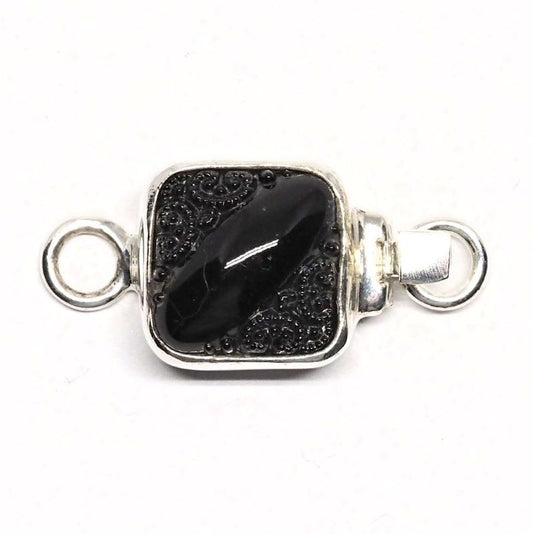 Tiny black clasp