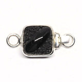 Tiny black clasp