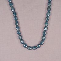 Turquoise and silver polka dot flat oval beads